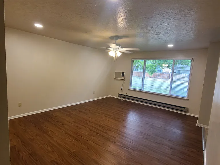 Living Room with Large Picture Window, Ceiling Fan