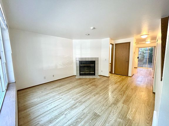 Living Room with Coat Closet and Alcove Under the Stairs