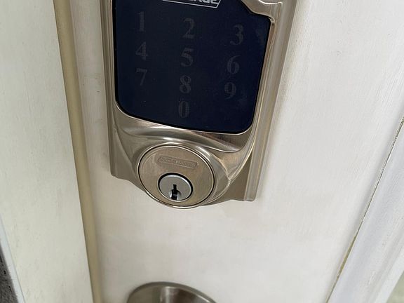 Touchscreen electronic lock, remote control capable.