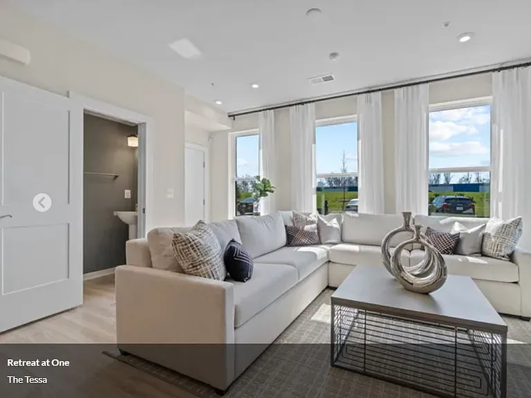 The family room, with three large windows for natural light