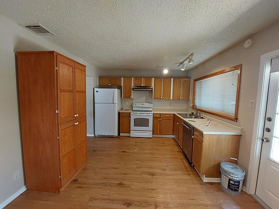 Spacious kitchen with ample cabinets. Fridge provided.