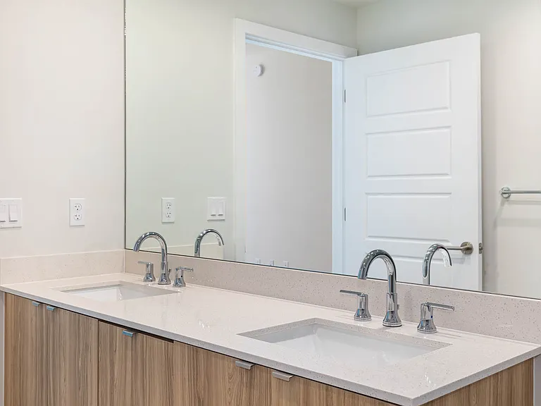 Large vanities and spacious showers are yours