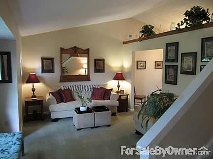 Roomy Living Room
						:
						LR, DR and Kitchen share a vaulted ceiling for a wonderfully open & airy feeling