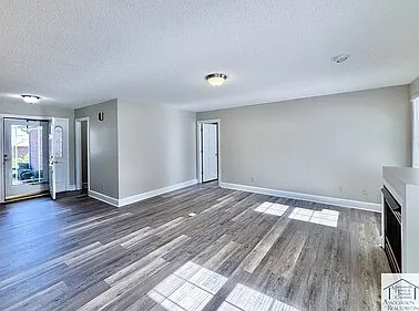 Living room with gas fireplace- tank on site