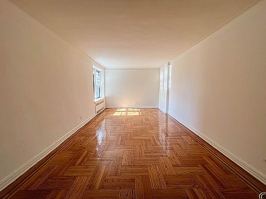 3rd image of 8615 Elmhurst Ave APT 4F