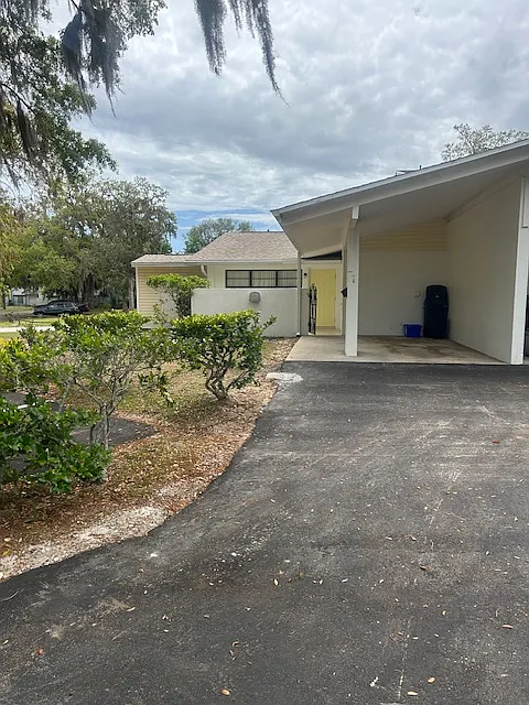 Covered carport and front entrance. - 1 Tomoka Meadows Blvd