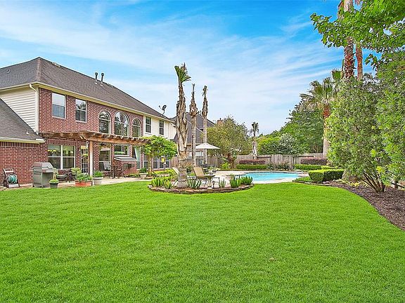It is rare to find a home in a master planned community that is in an ideal location and boasts a 12.309 SF lot and sparkling pool. This beautiful property has it all!