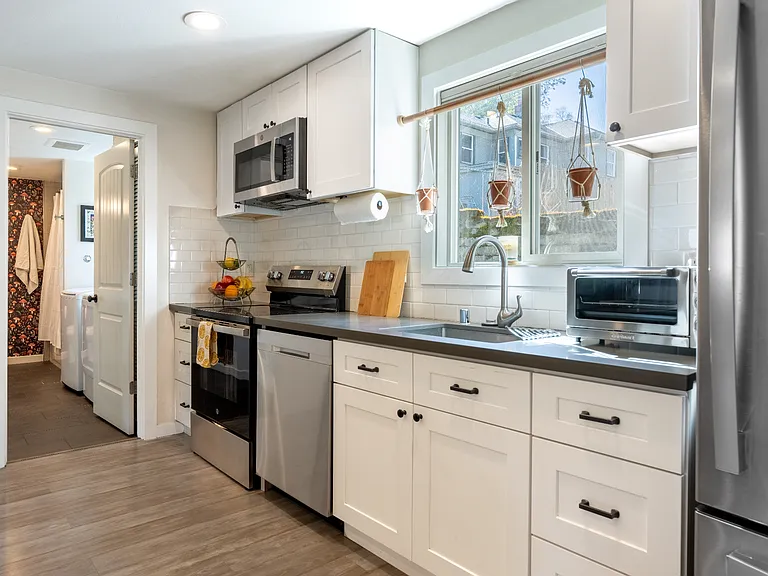 Kitchen, open concept, stainless steel appliances
