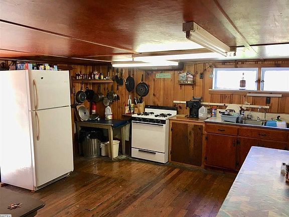 Kitchen with gas cooking.