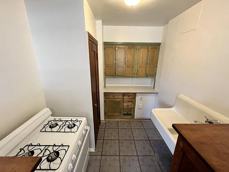Kitchen has lots of storage space.