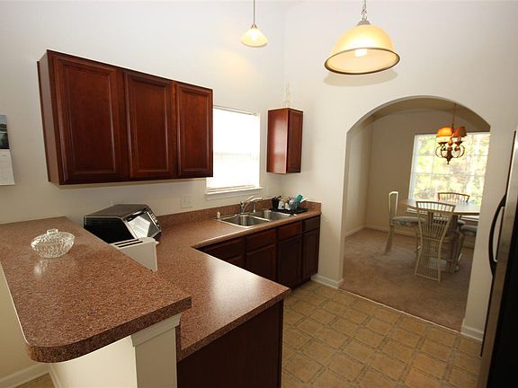 3rd image of 6490 Royal Pine Dr. #The Gardens at Heron Point