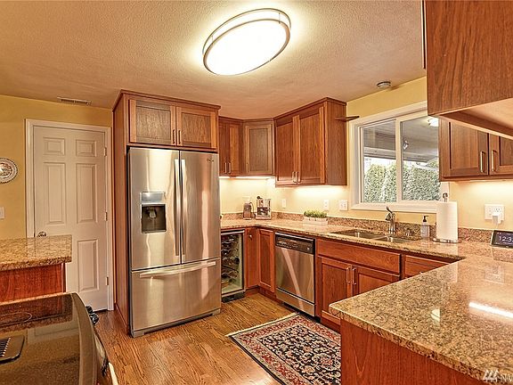 Granite counter tops, pantry and breakfast bar.