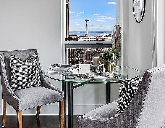 Corner with Space Needle, water and mountain range views