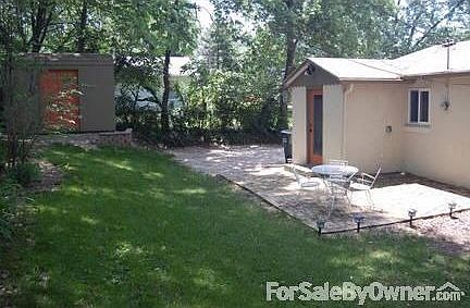 Back yard
						:
						Storage building, patio area