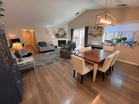 Open floor plan, upgraded light fixtures, and Milgard low-E windows throughout.