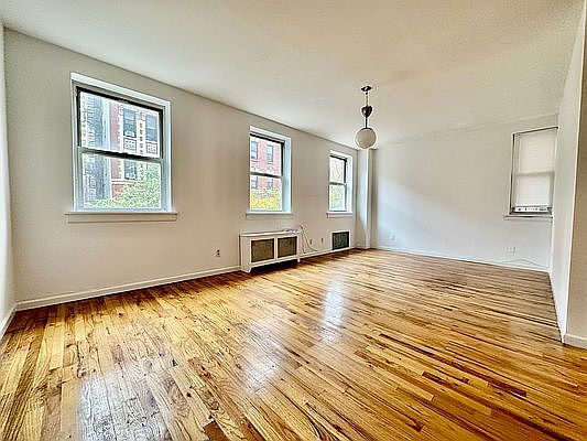 5th image of 303 E 12th St APT 3AB