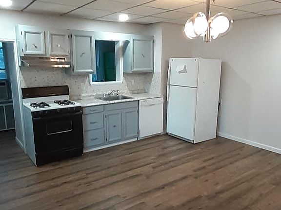 Eat in kitchen. Gas range, range hood and dishwasher