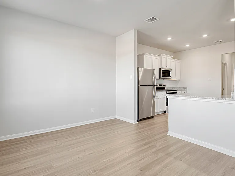 Dining room and kitchen.