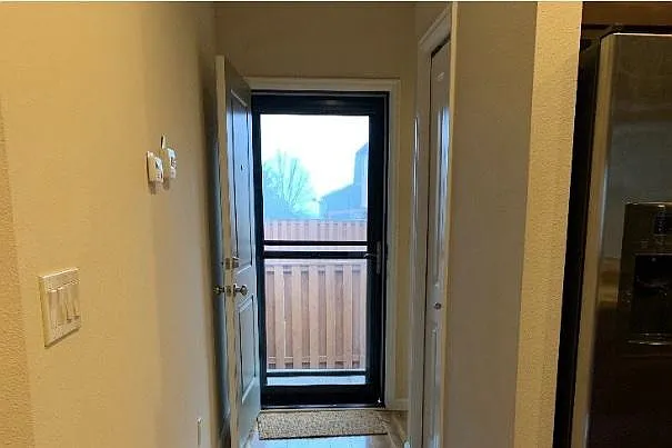 Rear Door, Powder Room to right