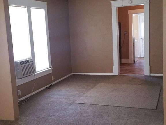 front room to middle room to kitchen to utility room