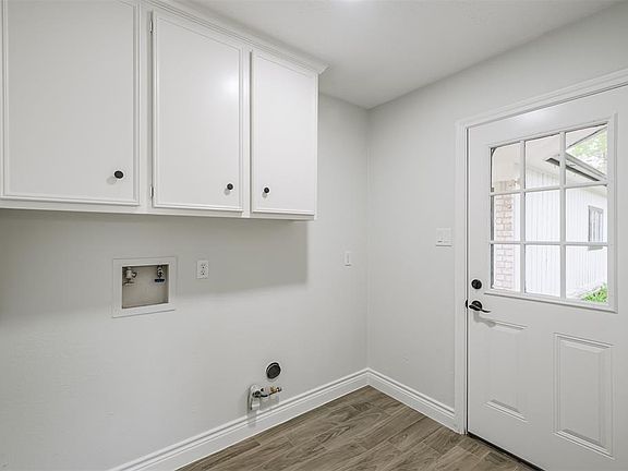 Large laundry room with built ins