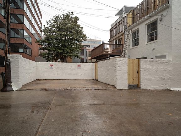 Unit entrance gate and parking space