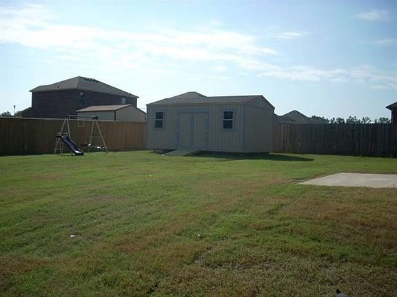 Backyard with storage building