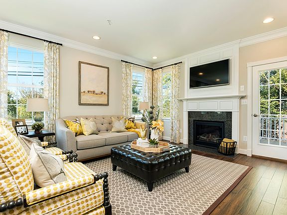 Family room with fireplace and deck access