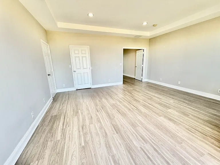 2nd floor Master Bedroom with Waterfront Terrace