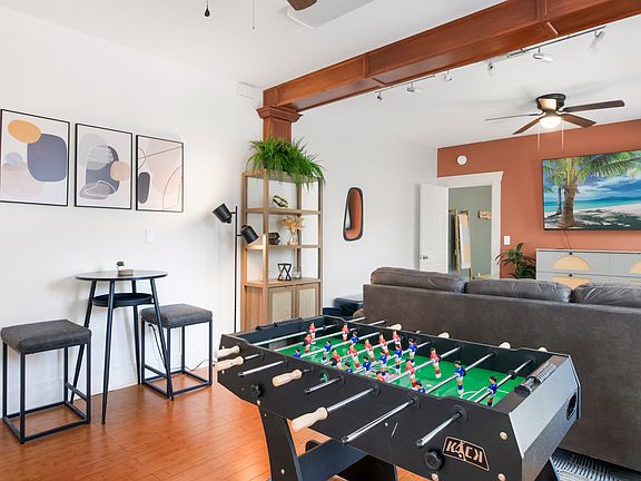 foosball table and bar height seating