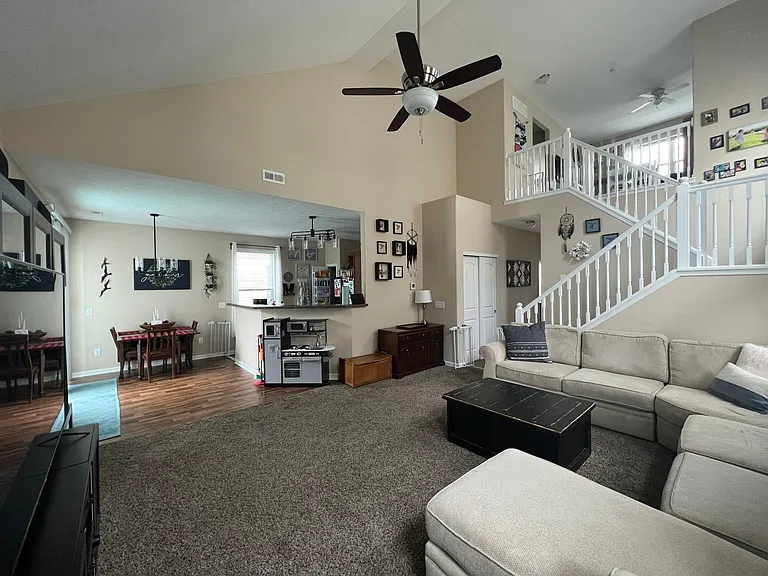 living room with vaulted ceilings