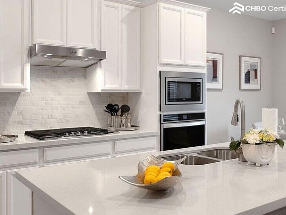 Quartz countertops for a sleek, easy-to-clean surface.