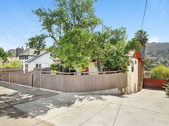 Parking for two cars in front additional parking in driveway. RV Parking behind Gate.