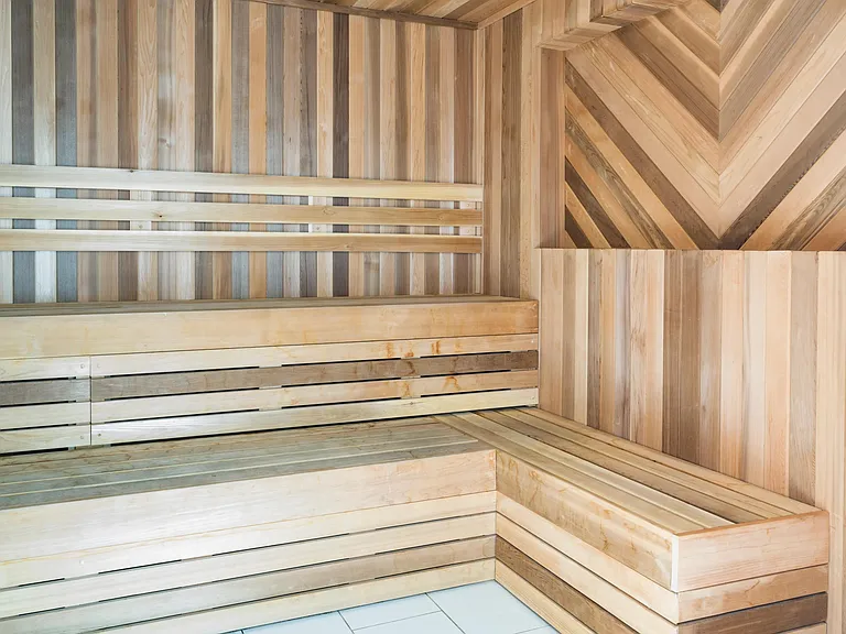 A cedar-lined sauna offers a restorative escape after the day, with Midtown Atlanta's parks and city energy just moments away.