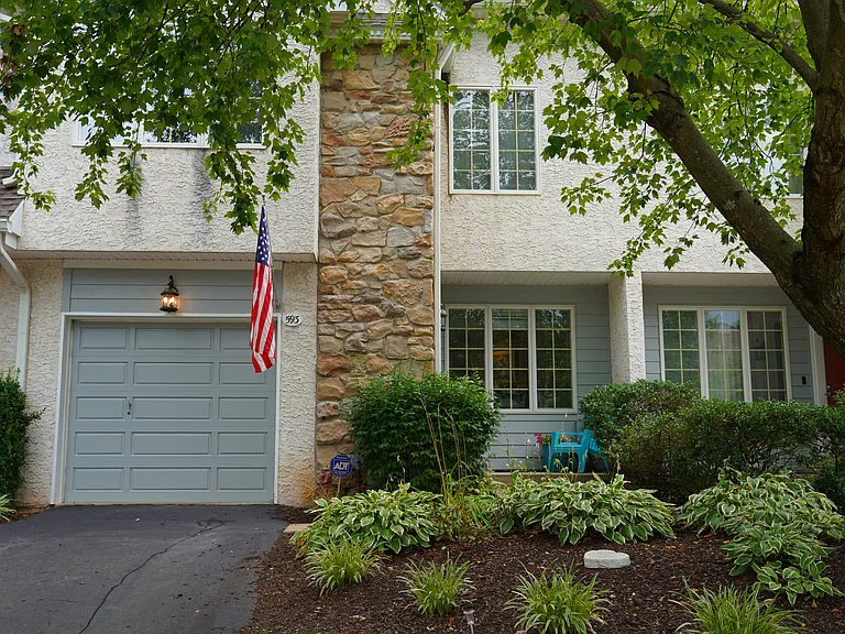 Front entrance, 1 car driveway with 1 car garage
