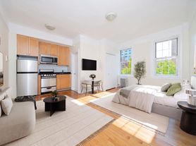 117 W 13th St