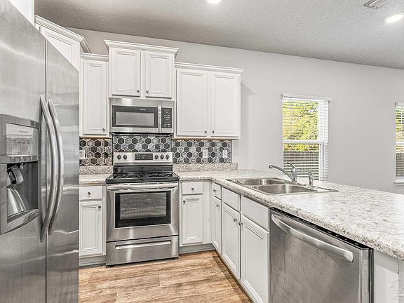 5th image of 6065 Royal Port Ct