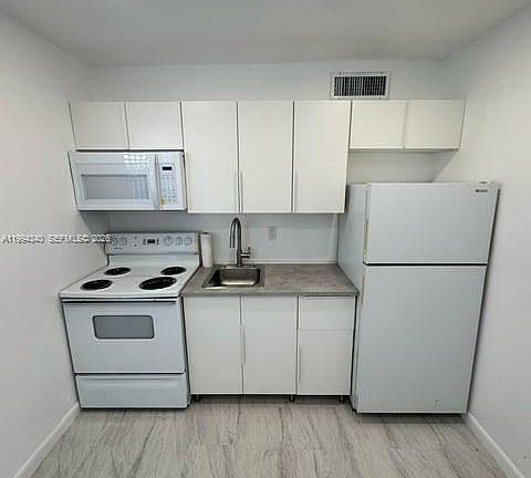 5th image of 30 SE 4th Ave APT 109