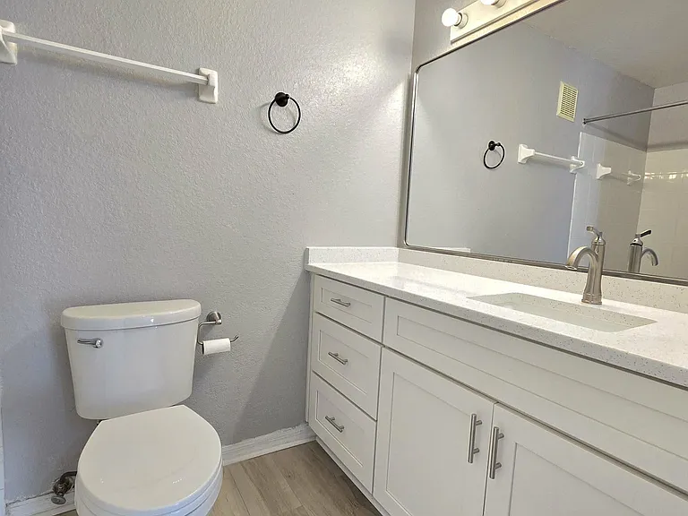 Masterbedroom bathroom (huge mirror) and bathtub not shown.