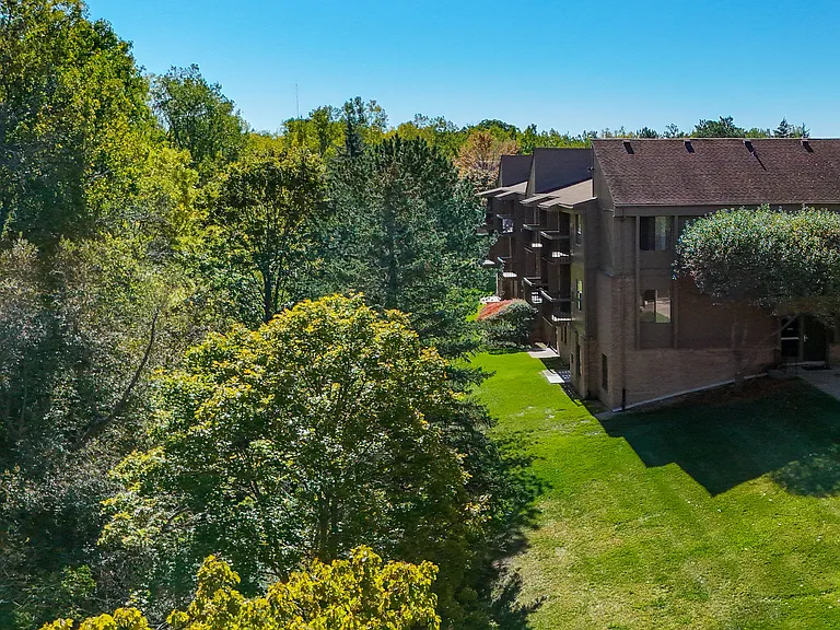 Expansive Green Space Apartment Building Exterior at Franklin River Apartments, Southfield, MI
