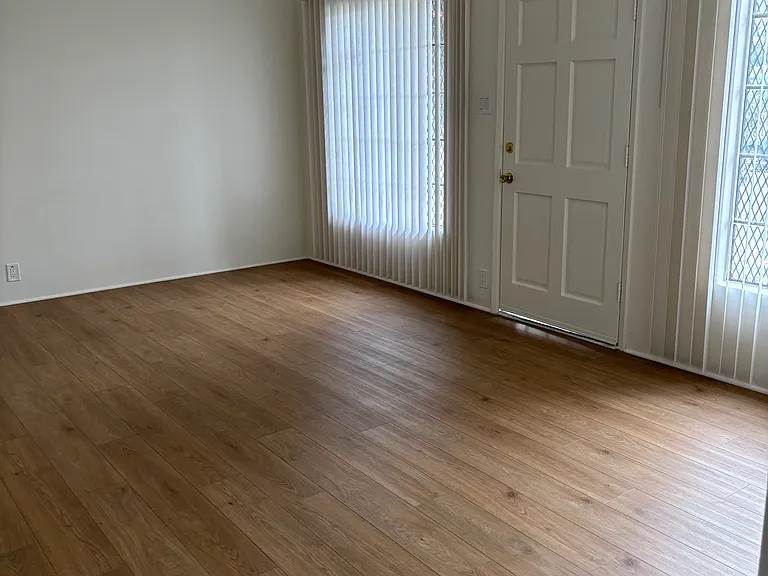 Front room; front door goes to front yard.-