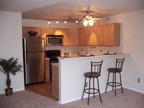 New Stainless Appliances, Light Fixtures, Cabinet Accents, Ceramic Tile