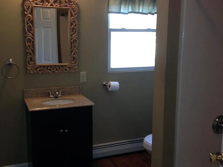 Full shower/tub in the large bathroom
