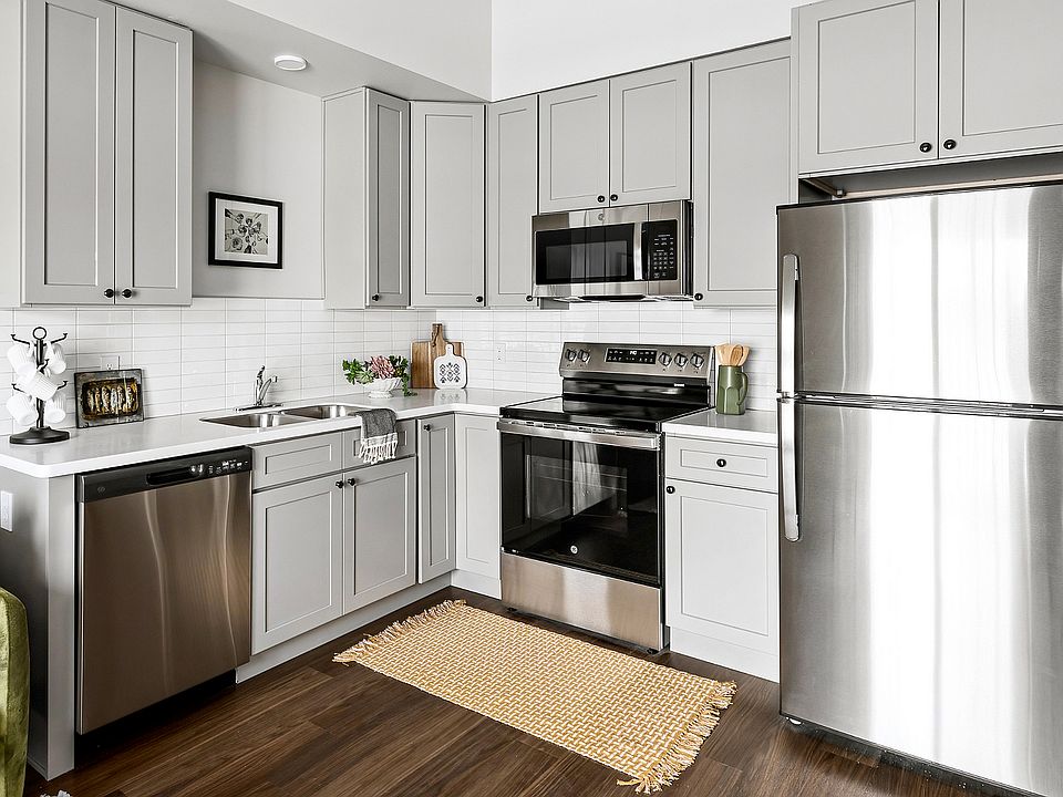 Experience the elegance of this sleek, modern kitchen designed for your culinary adventures.