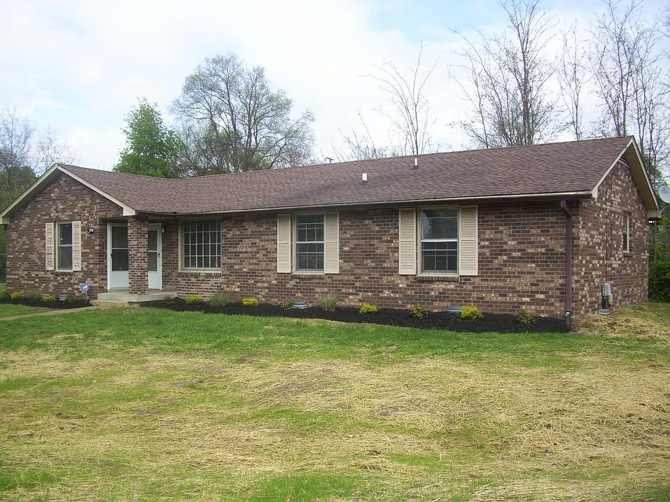 Brick Duplex with main porch entrance and view on A unit