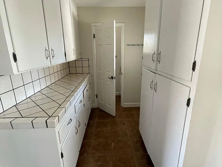 Bonus mud room from the garage with indoor laundry, bathroom and plenty of storage.