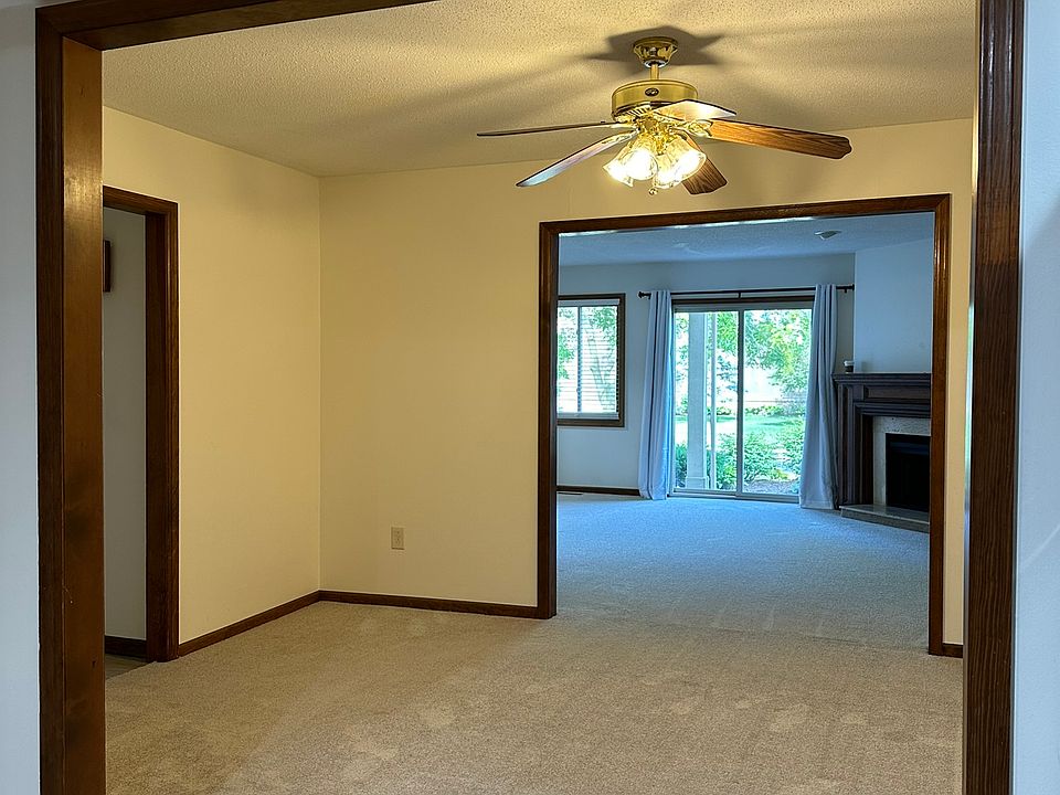 view from kitchen - looking through dining room and into living room - SIMILAR UNIT