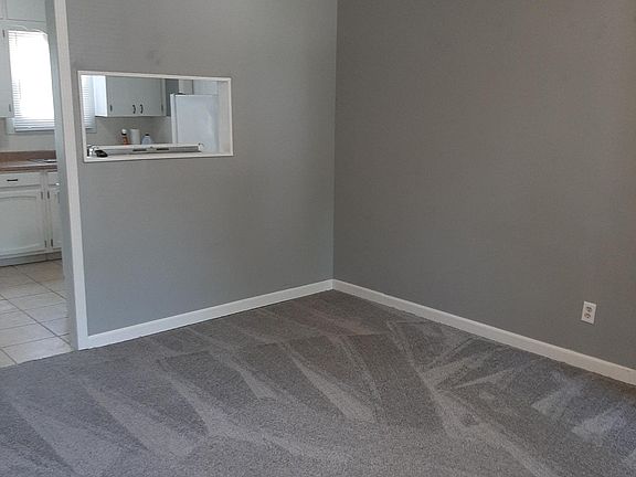 View from living room with glimpse of kitchen