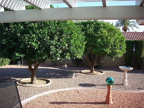Front & backyard have watering systems so no worries about maintenance