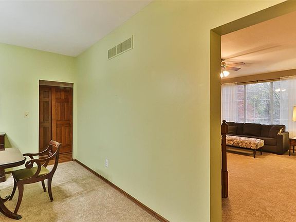 Entering the home the dining room sits immediately to your left which has access to the kitchen or continue to the family room.